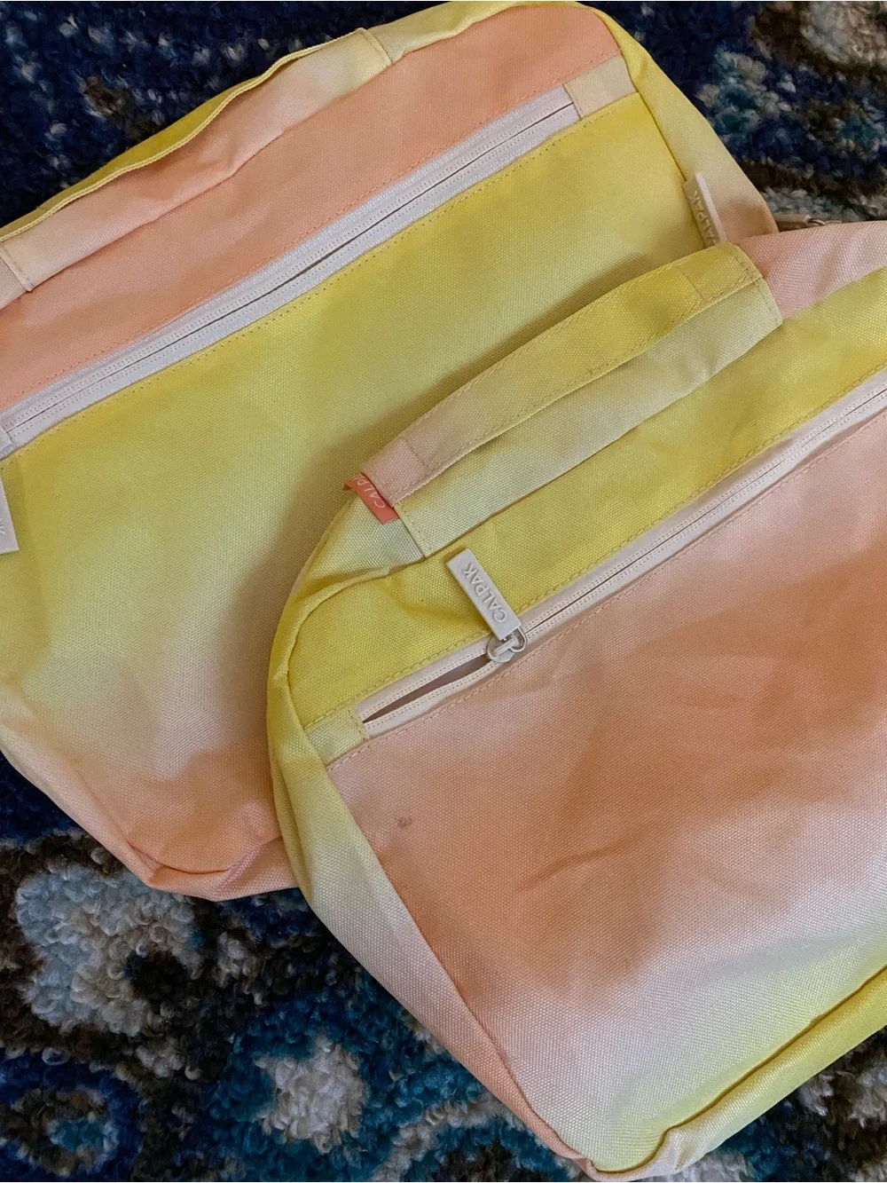 CALPAK Set of 2 Mesh Packing Cubes Travel Organizers Pastel Ombre Yellow Peach